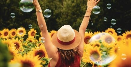 A whimsical crown of daisies and sunflowers.